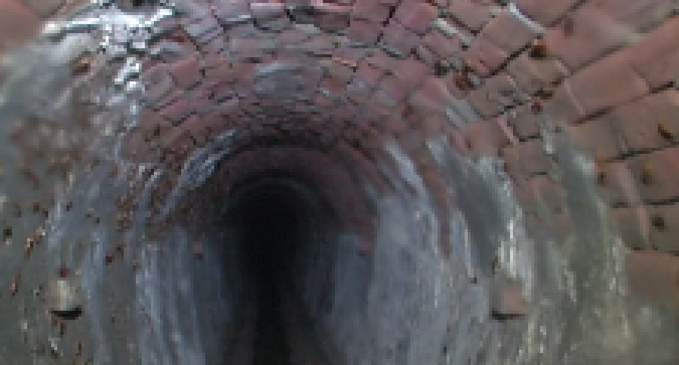 [57c475] *The world starts warping and with a woosh, everyones feet land on the floor of the sewer room. Luthor and Maya's unconcious bodies are laying on the ground. Sebastian stands between them.*