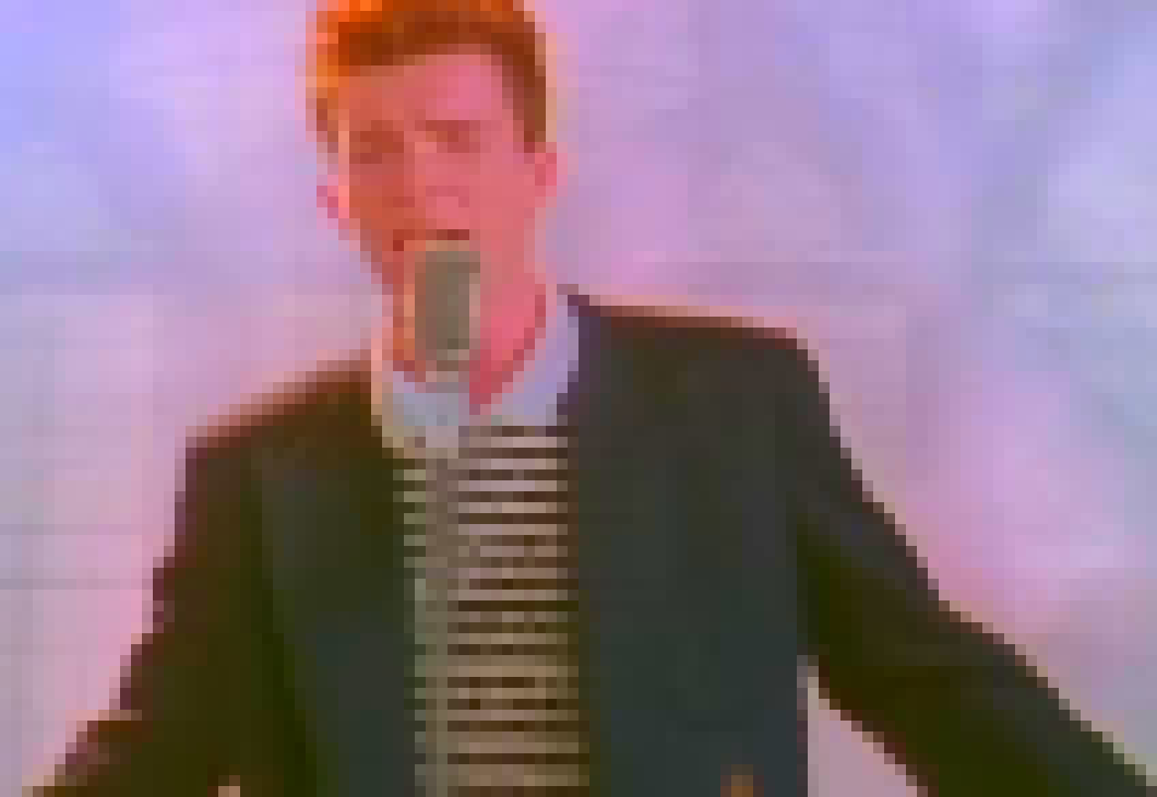 i like how rick astley has a pink glow around him like a vibe